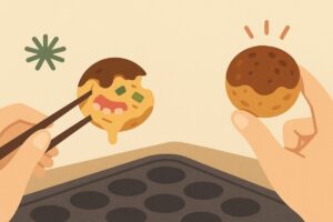 焦げたたこ焼きと柔らかく崩れたたこ焼きを見比べる手元の様子